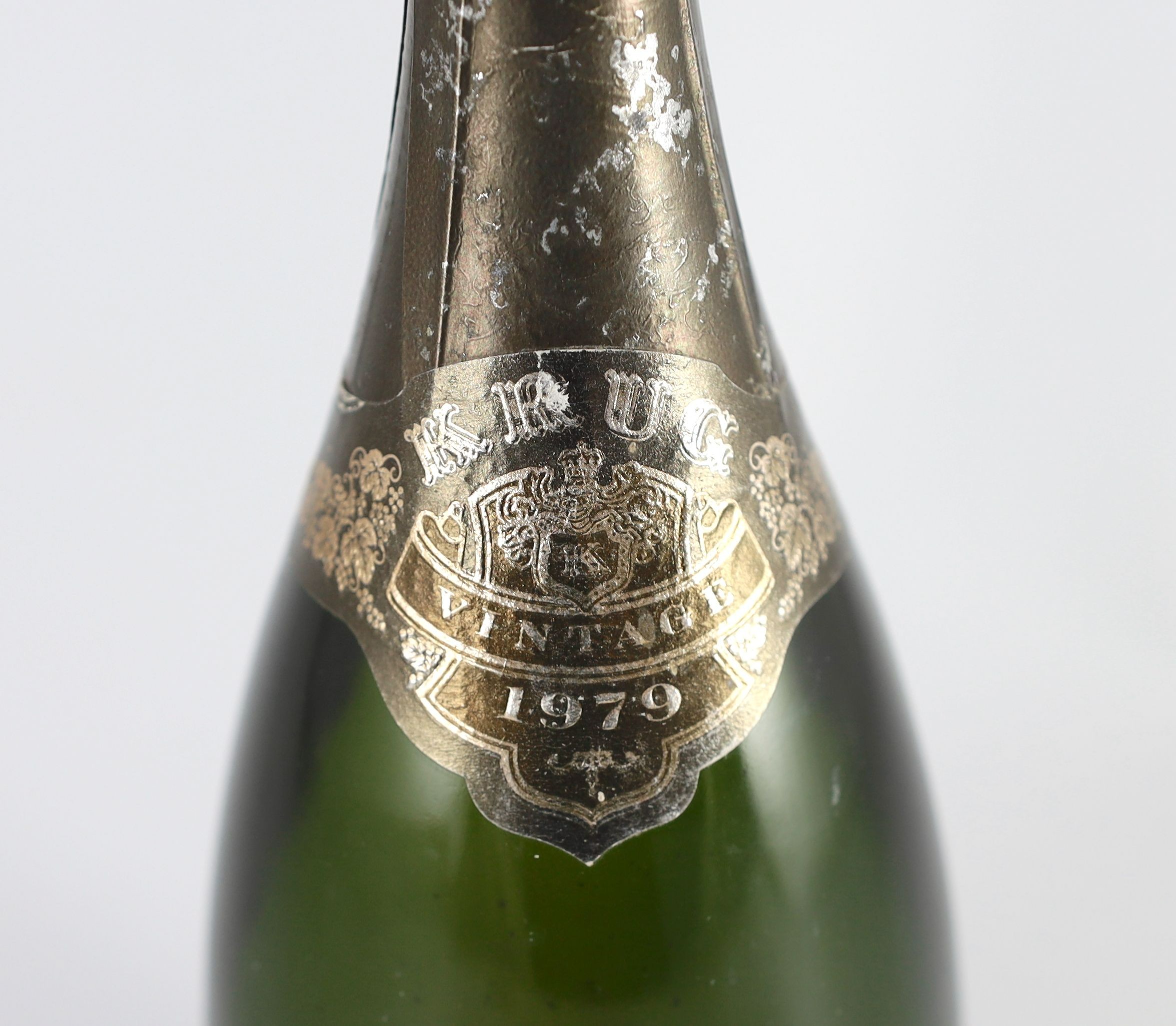 A bottle of Krug 1979 vintage champagne, 32cm high